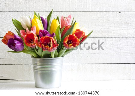 [Obrazek: stock-photo-spring-easter-tulips-in-buck...744370.jpg]