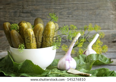 Pickles Gherkins Salted Cucumbers Still Life On Old Planks