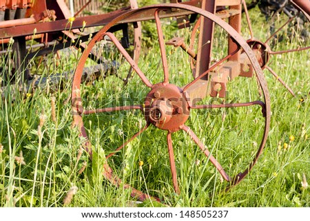 Old agriculture machinery outdated technology concept