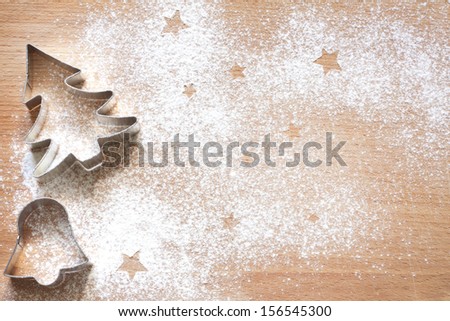 Abstract Christmas Food Background With Cookies Molds And Flour