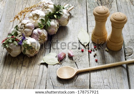 Organic garlic in the kitchen on the wooden table still life