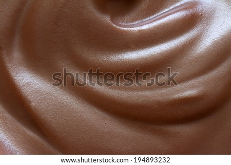 Chocolate cream closeup background texture