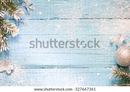 Snow and fir abstract christmas blue wooden background