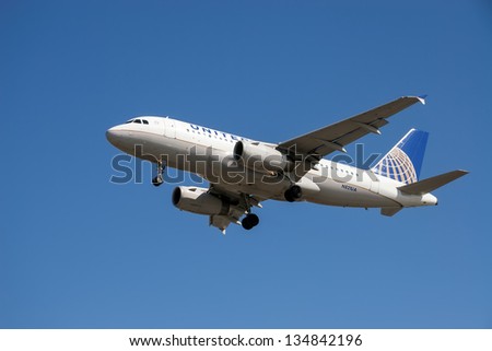 VANCOUVER, CANADA - MARCH 28: United Airlines aircraft on final approach to Vancouver International Airport on March 28, 2013. United Airlines today operates about 3,300 flights a day