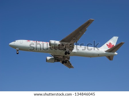 VANCOUVER, CANADA - MARCH 28: Air Canada Boeing aircraft on final approach to Vancouver International Airport on March 28, 2013. Air Canada is the largest airline company in Canada.