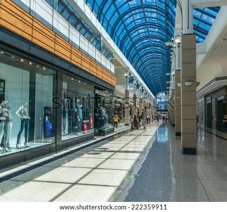 RICHMOND, BC, CANADA - JULY 17, 20014 - People can be seen inside the Richmond Centre. With over 230 stores and services, Richmond Centre is one of the Lower Mainland\'s best shopping experiences.