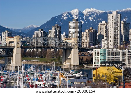 Burrard Bridge and Downtown Vancouver in sunny winter day.
