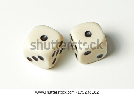 Pair of thrown dices showing two ones