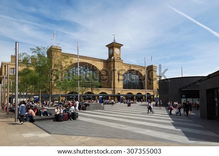 London, England August 2015 - Kings cross square and railway station with blue skies in the background