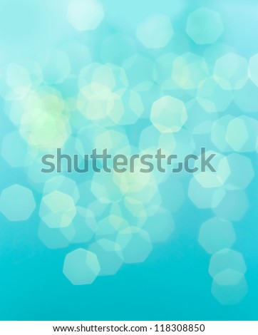 Bright glowing blue abstract background in the form of bokeh
