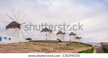 Windmills on a hill near the sea on the island of Mykonos - a place that must attend