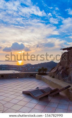 Sun beds in the courtyard at sunset Mediterranean.