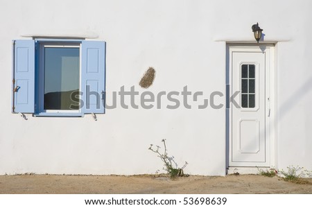 White door and window with blue shutters  in the White House - the Greek classical architecture