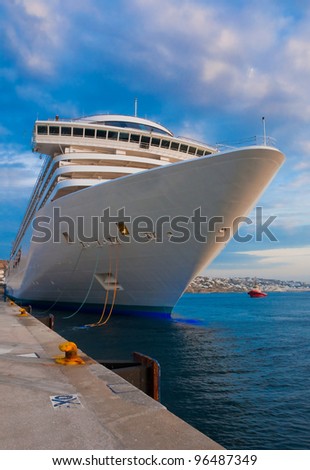 A large cruise ship anchored in port