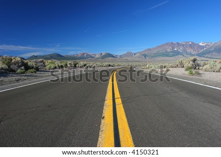 Scenic Road traveling through Mountains