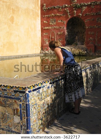 Study Abroad student looking at Reflecting Pool in the Alhambra Palace