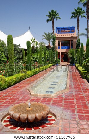 Beautiful Moorish garden on the grounds of a luxury hotel in Marrakech, Morocco