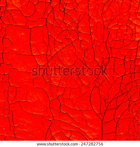 Abstract background of old coatings cracks and scratches the surface painted with red paint destroyed. For creative unusual vintage design