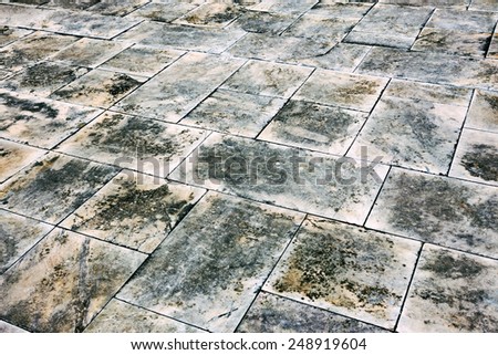 Gloomy textured background dirty marble tile street
