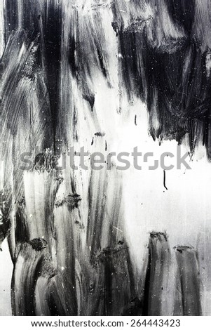 Creative background careless brush strokes dark paint, abstract textured background with flares and cracks. Grungy surface. Great background or texture for your project.