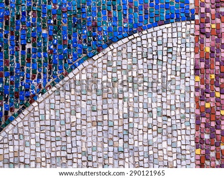 Old diagonal colorful mosaic texture on the wall. Landscape style. Great background or texture.