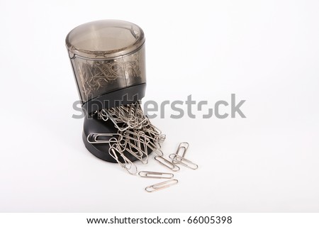 device for paper clips and lots of metal clips