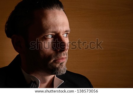 Portrait of a handsome stylish man with space for text on right side