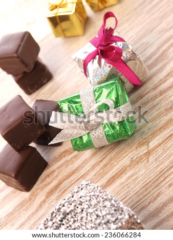 Colorful gift boxes with chocolate dices