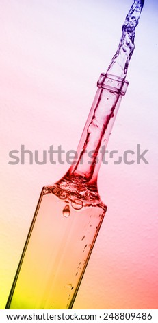 Colorful splashing bottle