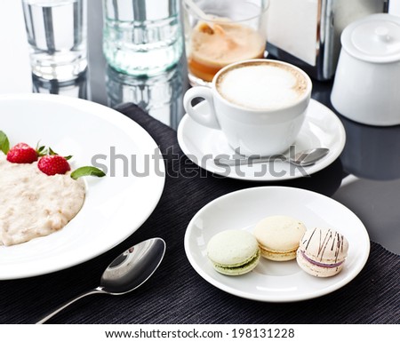 Semolina porridge in a plate with fresh strawberries. Health Breakfast