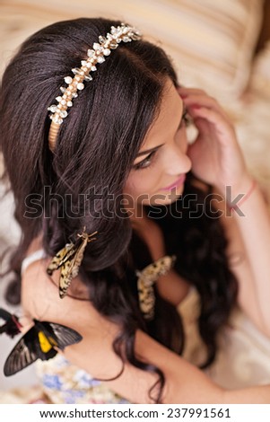 Beautiful handmade accessories on brown long hear