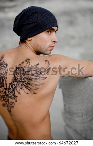 stock photo Muscular Sexy Man with tattoo