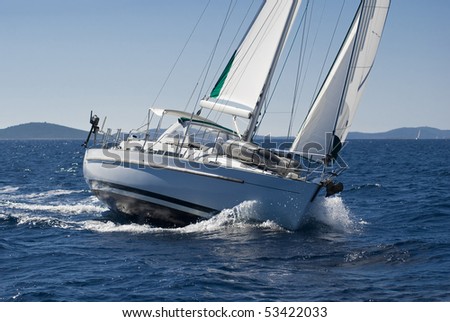 luxury yacht going by sea under sail