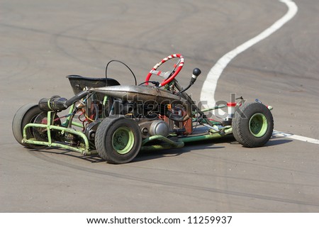 cart racing has stopped after race near to a line of competitions