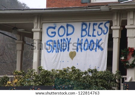 NEWTOWN, CT., USA, DEC 16, 2012: Sandy Hook Elementary School shooting, God Bless Sandy Hook hanging sign, Dec 16, 2012 in Newtown, CT., USA