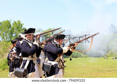 TORONTO – JUNE 18: Battle of Black Creek - Revolutionary War Reenactment in June 18 2011 in Black Creek Village, Toronto