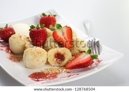 Delicious sweet dumplings stuffed with strawberries