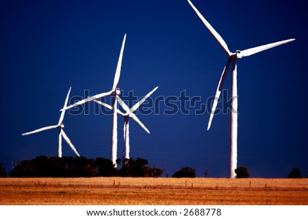 Wind farm at Wattle Point. Stunning image of wind turbines generating power and electricity against stark landscape. A great green power scene featuring generators and deep blue polarized sky.