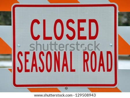 Seasonal Road Sign stating that the road is closed.