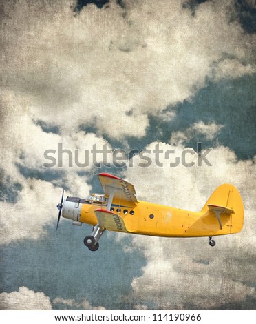 Old biplane in the sky