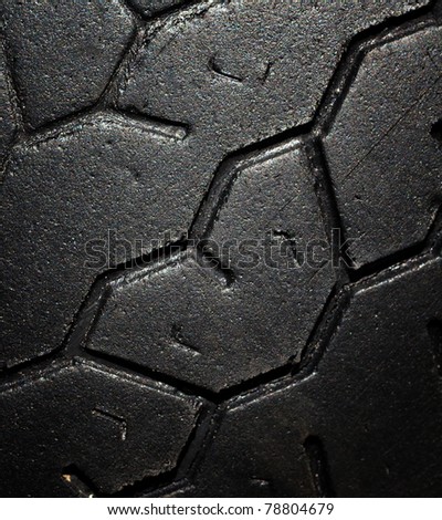 Old car black tire texture, industrial background close up