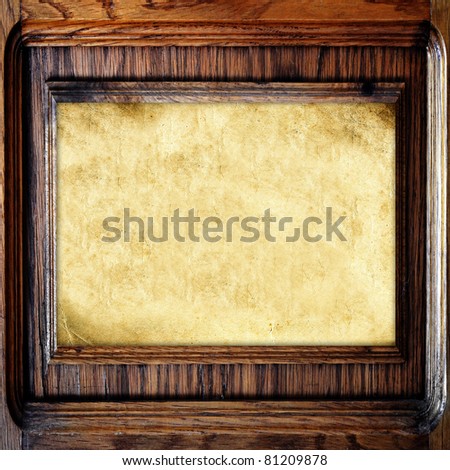 Old wooden frame with paper for text or image, vintage background
