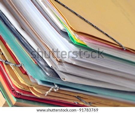 Stack of old paper files