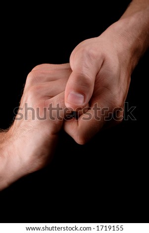 male hands clasped together