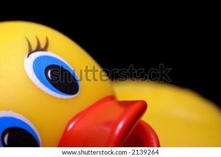 rubber bath duck with funny expression
