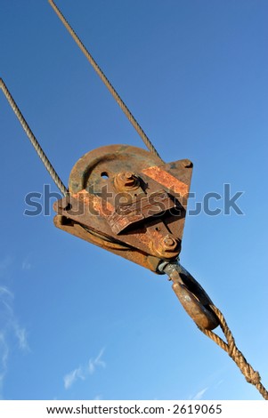 old rusty industrial lifting equipment in fishing harbour