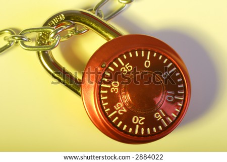 red combination lock and chain