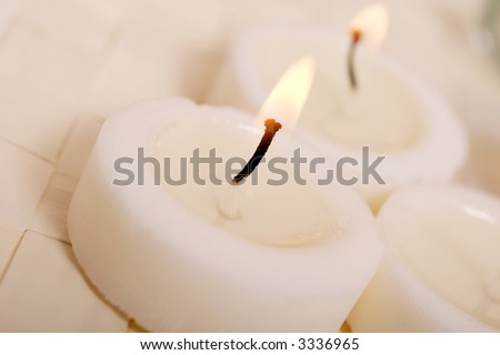spa treatment, lit candles, relaxed atmosphere