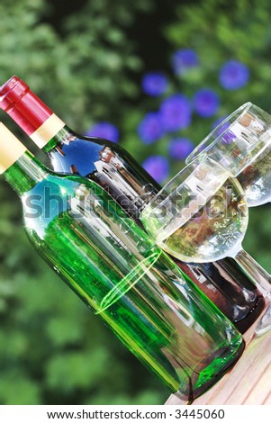 red wine and white wine bottles and glasses, garden party celebrations