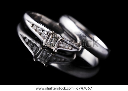 stock photo white gold diamond engagement ring and wedding band